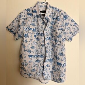 Kids short sleeved pearl snap western wear shirt.